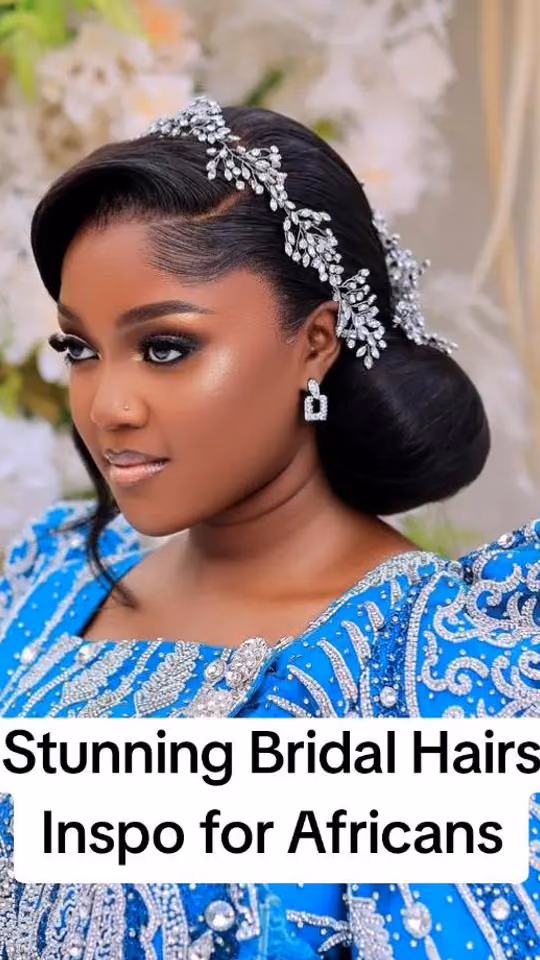 Bride with a sleek side-swept low bun and a crystal hair vine